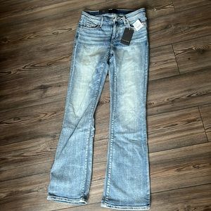 Buckle black universal fit mid-rise bootcut jeans